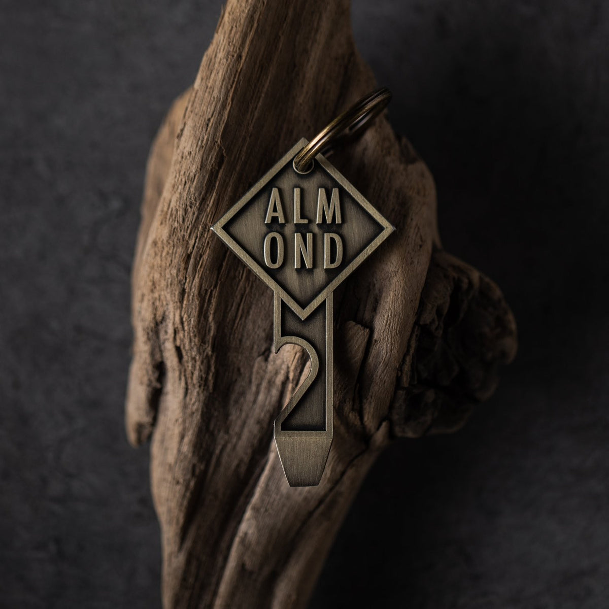 Almendra - Abrebotellas con llave de aleta